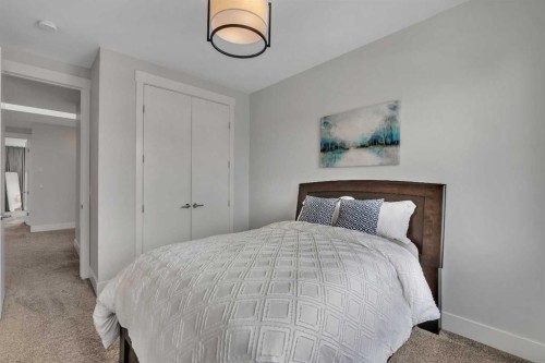 1148 Radnor Avenue Ne, Calgary, AB - Indoor Photo Showing Bedroom