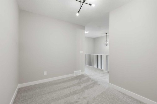 8 Waterford Glen, Chestermere, AB - Indoor Photo Showing Other Room