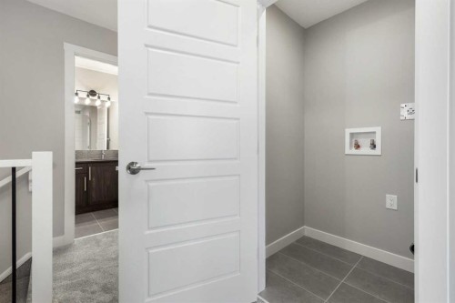 8 Waterford Glen, Chestermere, AB - Indoor Photo Showing Other Room