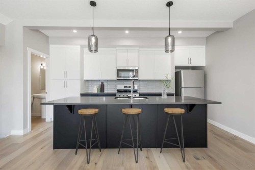 8 Waterford Glen, Chestermere, AB - Indoor Photo Showing Kitchen With Upgraded Kitchen