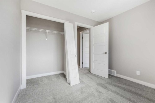 8 Waterford Glen, Chestermere, AB - Indoor Photo Showing Other Room