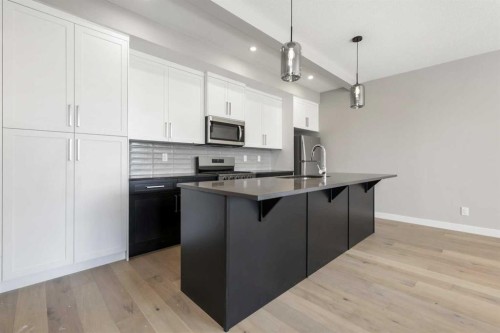 8 Waterford Glen, Chestermere, AB - Indoor Photo Showing Kitchen With Upgraded Kitchen