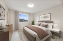 219 Waterford Heights, Chestermere, AB  - Indoor Photo Showing Bedroom 