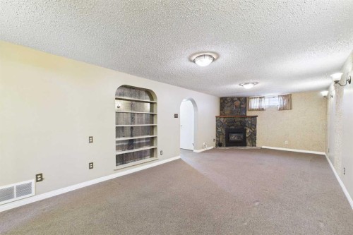307 Wascana Road Se, Calgary, AB - Indoor With Fireplace