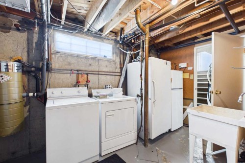 307 Wascana Road Se, Calgary, AB - Indoor Photo Showing Laundry Room