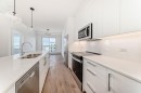 2107-63 Corner Glen Crescent Ne, Calgary, AB  - Indoor Photo Showing Kitchen With Double Sink With Upgraded Kitchen 
