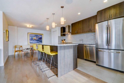 1409-303 13 Avenue Sw, Calgary, AB - Indoor Photo Showing Kitchen With Stainless Steel Kitchen With Upgraded Kitchen