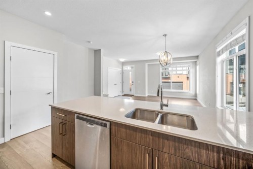 1005 Sage Meadows Gardens Nw, Calgary, AB - Indoor Photo Showing Kitchen With Double Sink