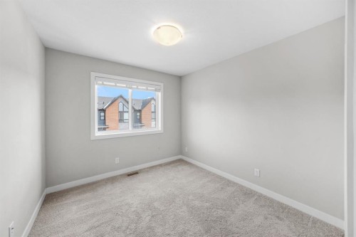 1005 Sage Meadows Gardens Nw, Calgary, AB - Indoor Photo Showing Other Room