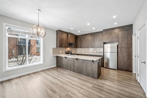 1005 Sage Meadows Gardens Nw, Calgary, AB - Indoor Photo Showing Kitchen With Stainless Steel Kitchen