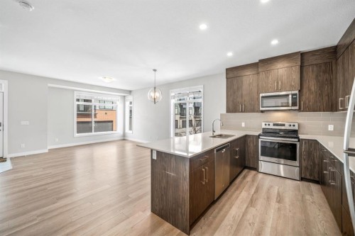 1005 Sage Meadows Gardens Nw, Calgary, AB - Indoor Photo Showing Kitchen With Stainless Steel Kitchen With Upgraded Kitchen