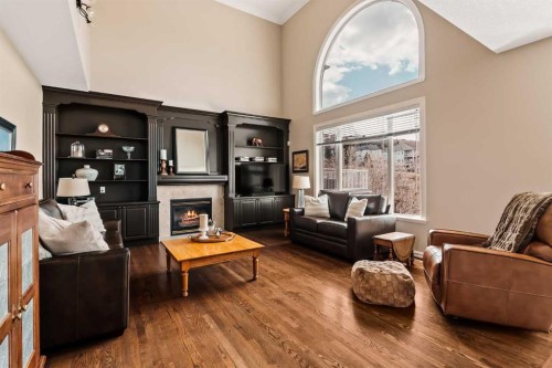 70 Patterson Close Sw, Calgary, AB - Indoor Photo Showing Living Room With Fireplace