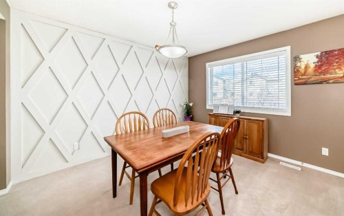67 Cimarron Meadows Bay, Okotoks, AB - Indoor Photo Showing Dining Room
