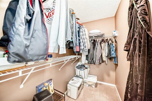 67 Cimarron Meadows Bay, Okotoks, AB - Indoor With Storage