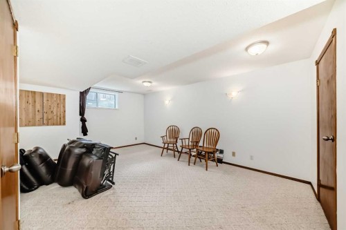 67 Cimarron Meadows Bay, Okotoks, AB - Indoor Photo Showing Other Room