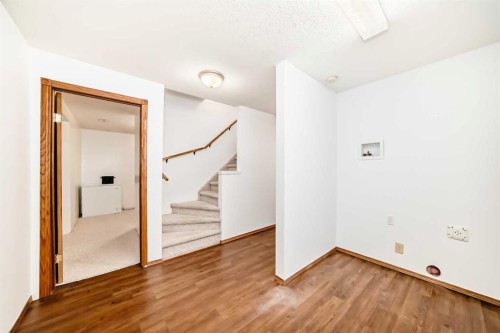 67 Cimarron Meadows Bay, Okotoks, AB - Indoor Photo Showing Other Room
