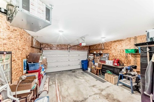 67 Cimarron Meadows Bay, Okotoks, AB - Indoor Photo Showing Garage