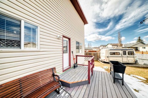 67 Cimarron Meadows Bay, Okotoks, AB - Outdoor With Deck Patio Veranda
