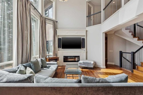 58 Scimitar View Nw, Calgary, AB - Indoor Photo Showing Living Room With Fireplace