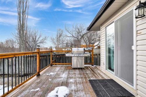92 Bow Ridge Crescent, Cochrane, AB - Outdoor With Deck Patio Veranda With Exterior