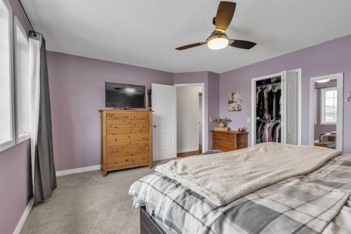 92 Bow Ridge Crescent, Cochrane, AB - Indoor Photo Showing Bedroom