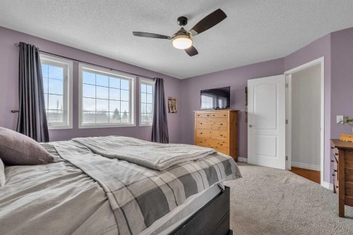 92 Bow Ridge Crescent, Cochrane, AB - Indoor Photo Showing Bedroom
