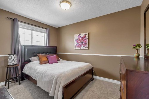92 Bow Ridge Crescent, Cochrane, AB - Indoor Photo Showing Bedroom