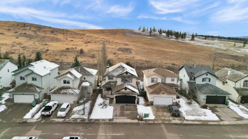 92 Bow Ridge Crescent, Cochrane, AB - Outdoor With Facade