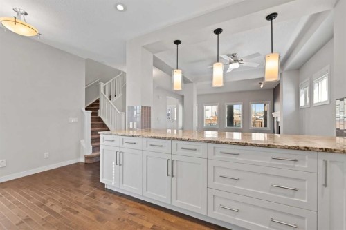 83 Drake Landing Loop, Okotoks, AB - Indoor Photo Showing Kitchen With Upgraded Kitchen