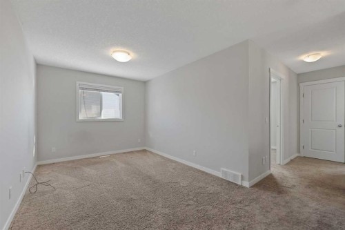 83 Drake Landing Loop, Okotoks, AB - Indoor Photo Showing Other Room