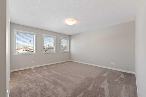 83 Drake Landing Loop, Okotoks, AB - Indoor Photo Showing Other Room