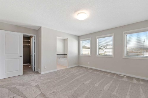 83 Drake Landing Loop, Okotoks, AB - Indoor Photo Showing Other Room