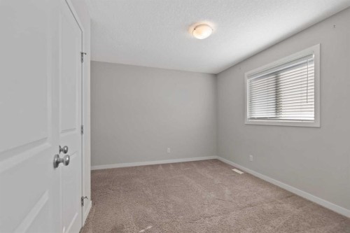 83 Drake Landing Loop, Okotoks, AB - Indoor Photo Showing Other Room