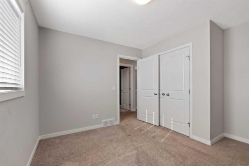 83 Drake Landing Loop, Okotoks, AB - Indoor Photo Showing Other Room
