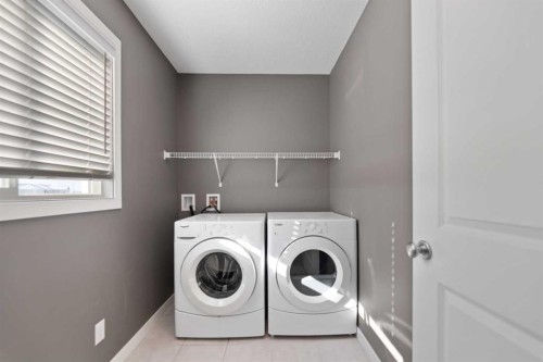 83 Drake Landing Loop, Okotoks, AB - Indoor Photo Showing Laundry Room