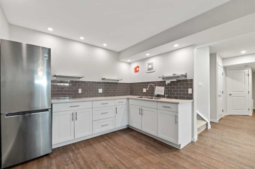 83 Drake Landing Loop, Okotoks, AB - Indoor Photo Showing Kitchen With Upgraded Kitchen