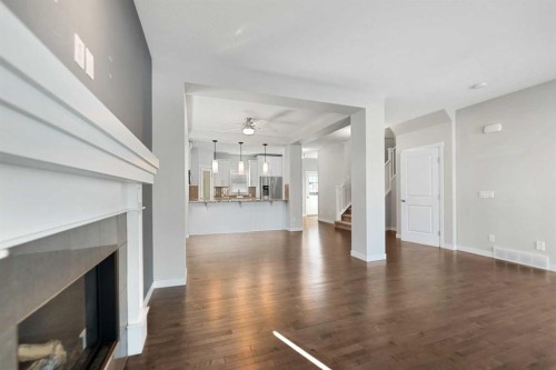 83 Drake Landing Loop, Okotoks, AB - Indoor With Fireplace