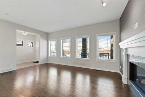 83 Drake Landing Loop, Okotoks, AB - Indoor With Fireplace