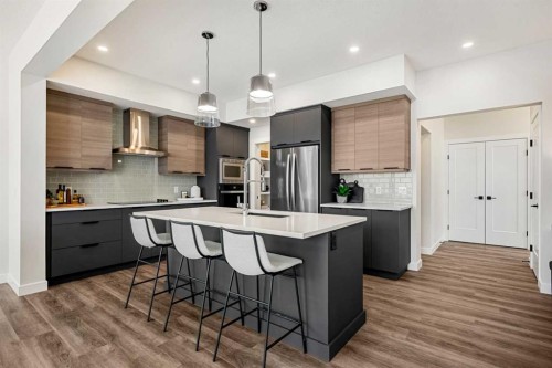 121 Quartz Crescent, Cochrane, AB - Indoor Photo Showing Kitchen With Upgraded Kitchen
