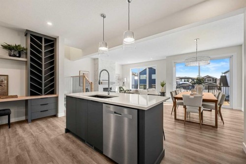 121 Quartz Crescent, Cochrane, AB - Indoor Photo Showing Kitchen With Upgraded Kitchen