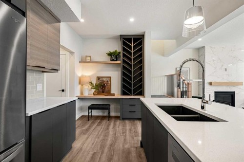 121 Quartz Crescent, Cochrane, AB - Indoor Photo Showing Kitchen With Double Sink