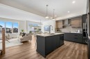 121 Quartz Crescent, Cochrane, AB  - Indoor Photo Showing Kitchen With Upgraded Kitchen 