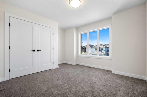 121 Quartz Crescent, Cochrane, AB - Indoor Photo Showing Other Room
