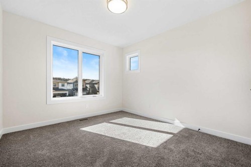 121 Quartz Crescent, Cochrane, AB - Indoor Photo Showing Other Room