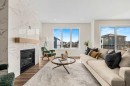 121 Quartz Crescent, Cochrane, AB  - Indoor Photo Showing Living Room With Fireplace 