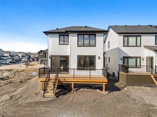121 Quartz Crescent, Cochrane, AB - Outdoor With Deck Patio Veranda