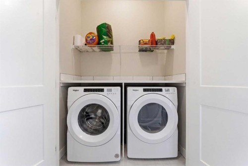 56 Iris Crescent, Okotoks, AB - Indoor Photo Showing Laundry Room