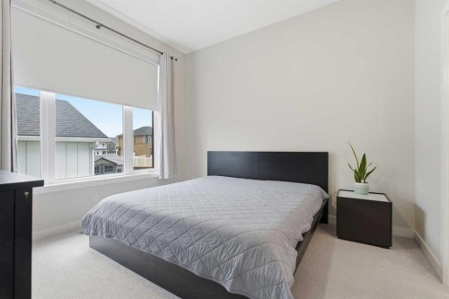 56 Iris Crescent, Okotoks, AB - Indoor Photo Showing Bedroom