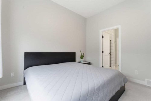 56 Iris Crescent, Okotoks, AB - Indoor Photo Showing Bedroom