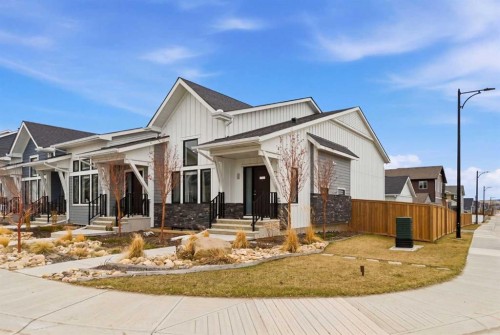 56 Iris Crescent, Okotoks, AB - Outdoor With Facade